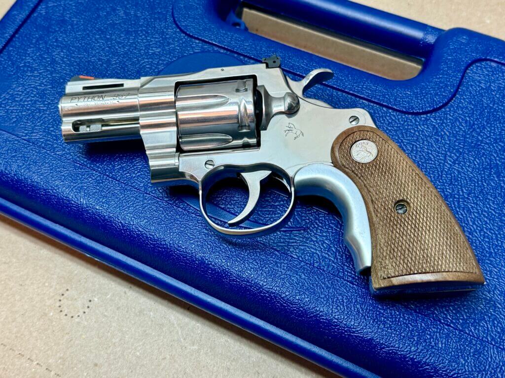 Colt Python revolver left side on case