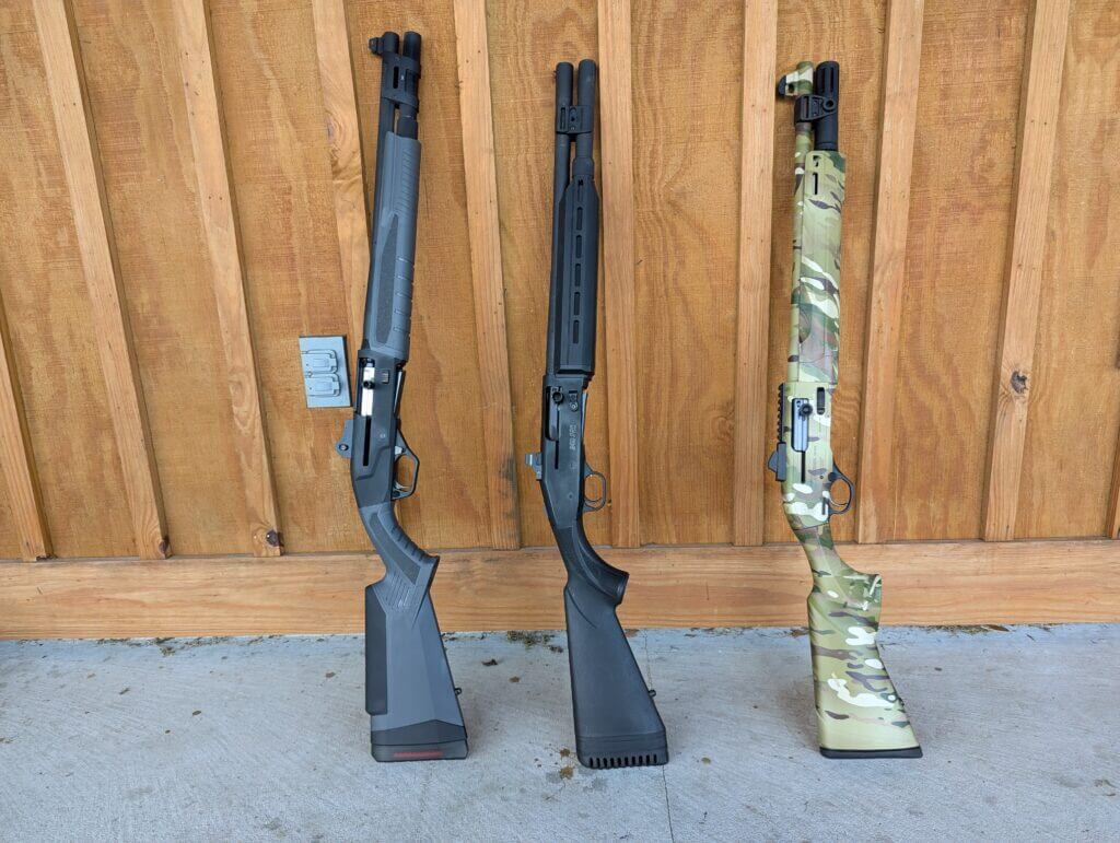 three tactical shotguns side by side