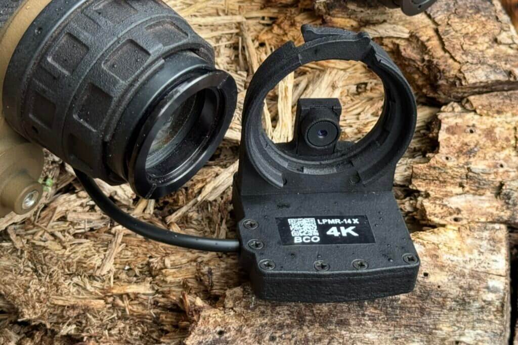 LPMR-X plugged into night vision on rough wood log