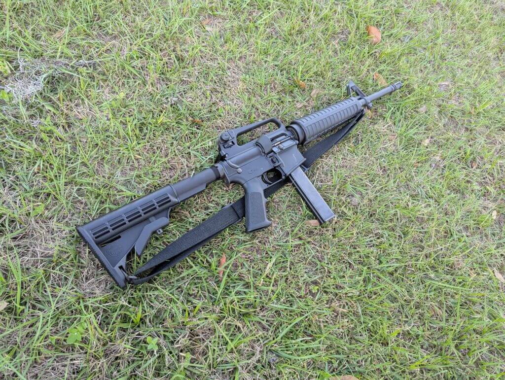retro LAR-9 AR rifle on grass