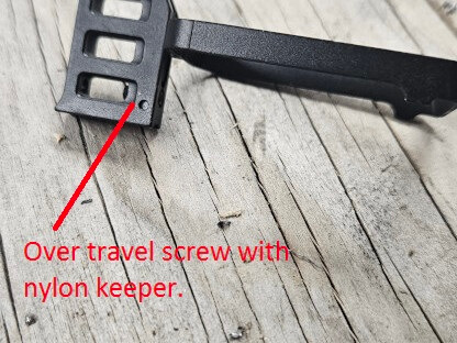 Double stack with over travel screw and nylon keeper.