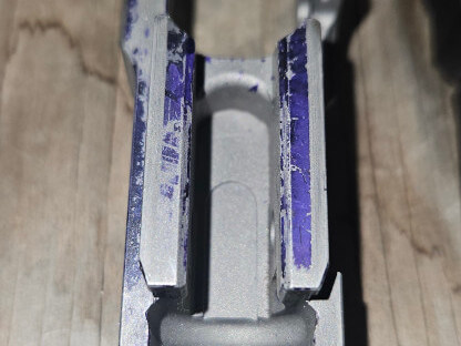 Different brand frame with radiused edge on vertical impact surface.