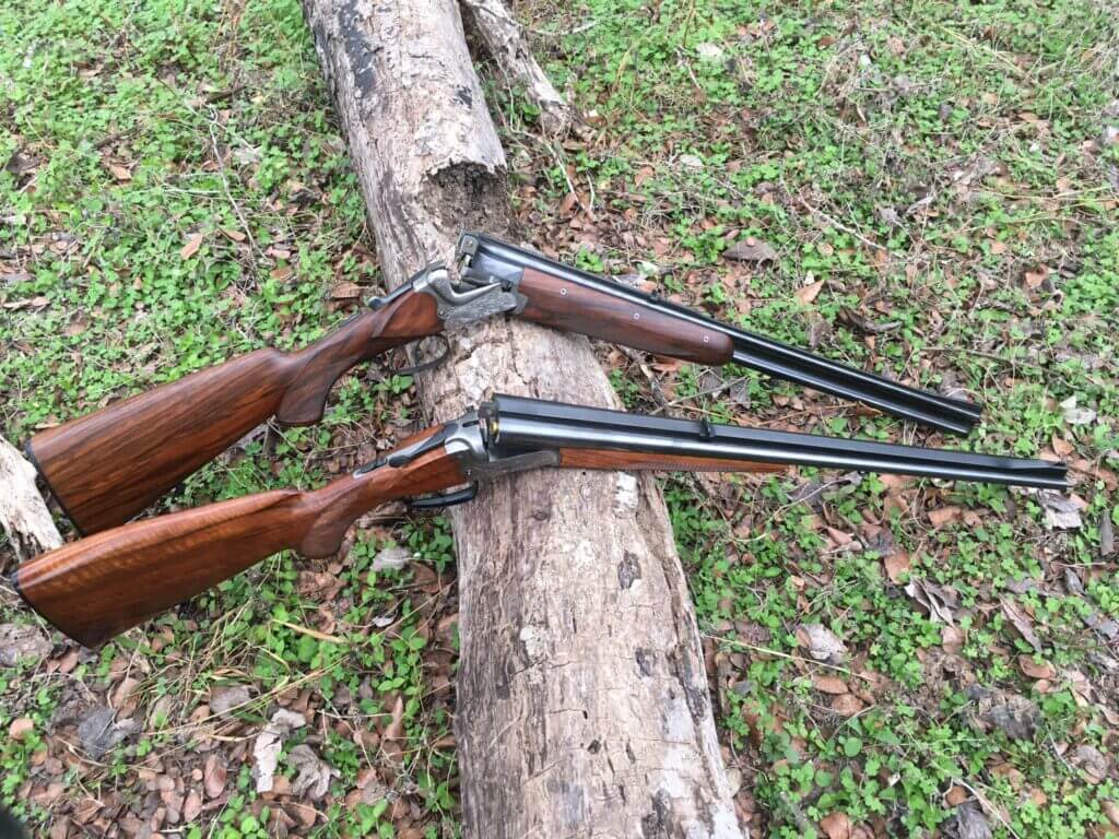 Old School Guns Part 2 - two shotguns over a log