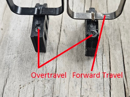 MAC 9 Double Stack trigger on the left and other 2011 trigger on the right.