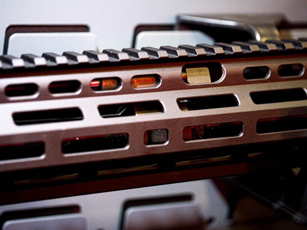 Close up of the right side of the hand guard showing the piston inside the handguard.