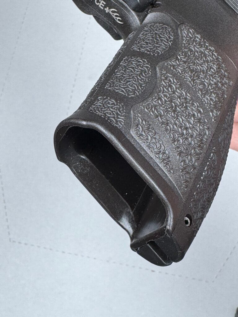 Magazine well on HK handgun