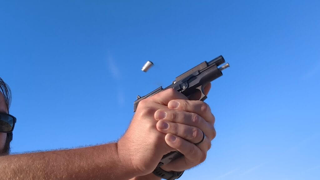 Recoiling handgun
