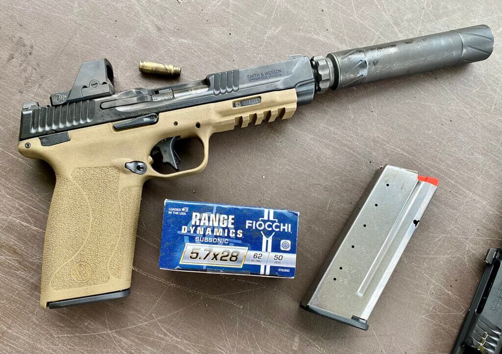 Suppressed handgun with 5.7x28mm ammo and a magazine