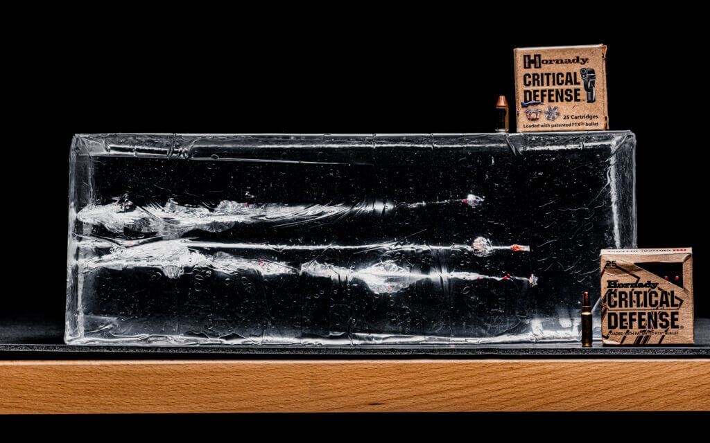 Ammo streaks through clear ballistic gel 