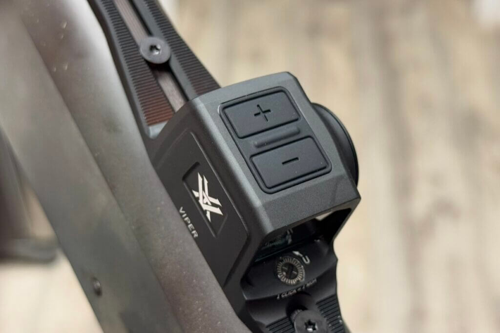 Control buttons on a red dot sight