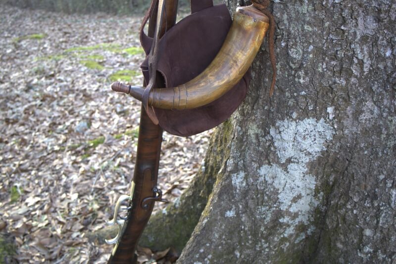 muzzleloader squirrel rifle with hunting pouch