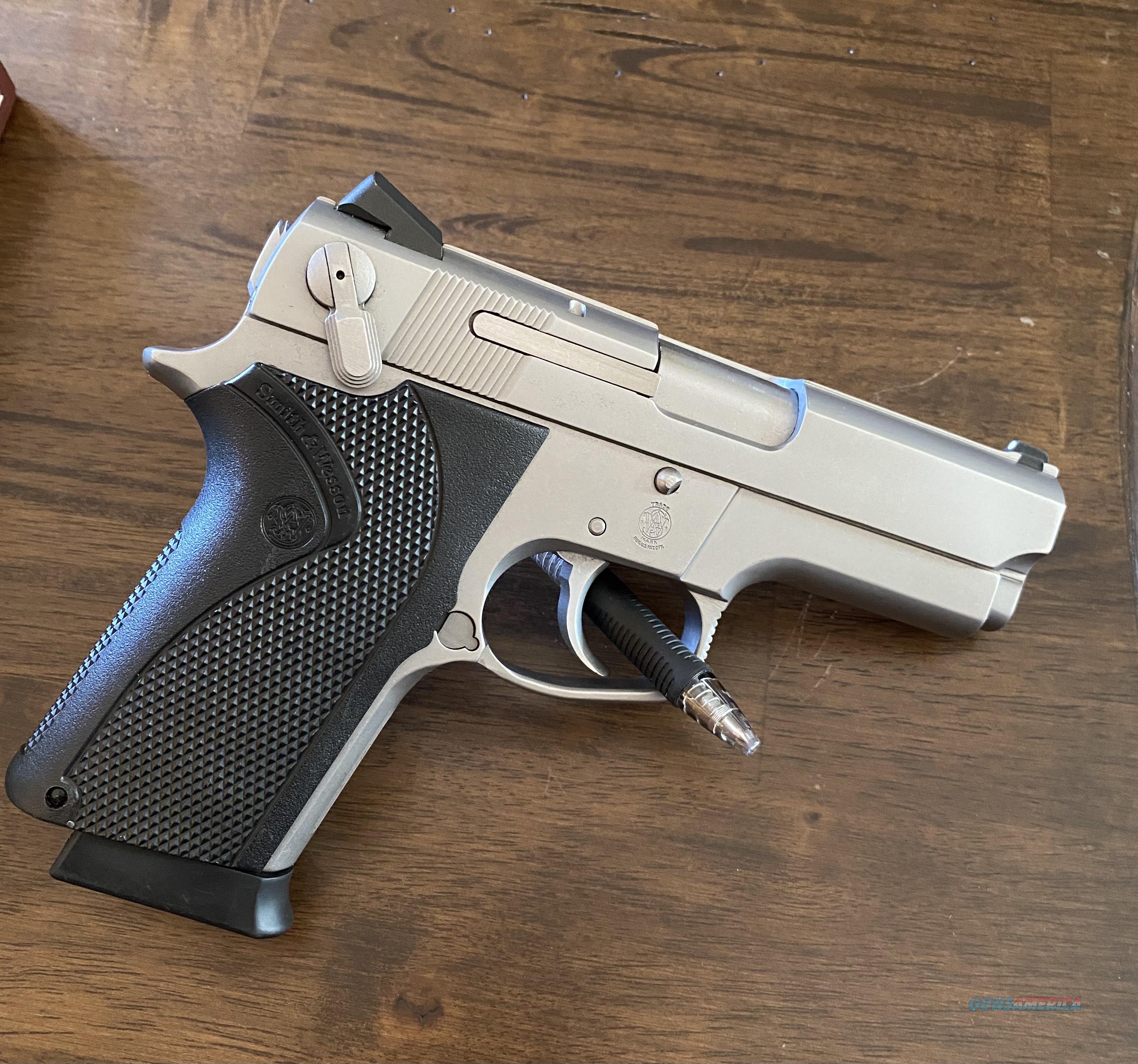 Smith and Wesson 4516 semi auto 45 acp pistol. ... for sale