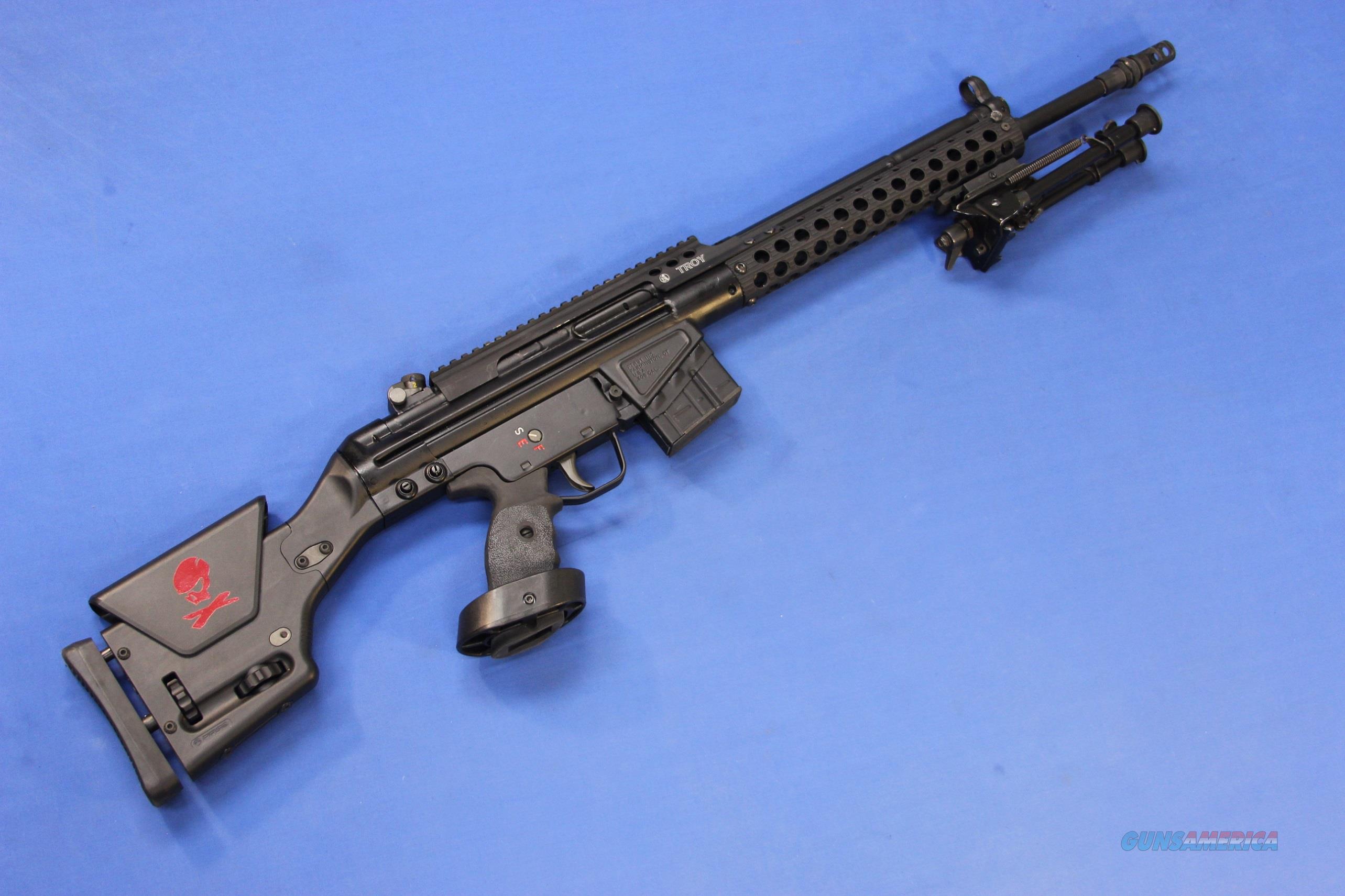 This rifle features a Mag-Pul PRS2 adjustable stock, black finished receive...